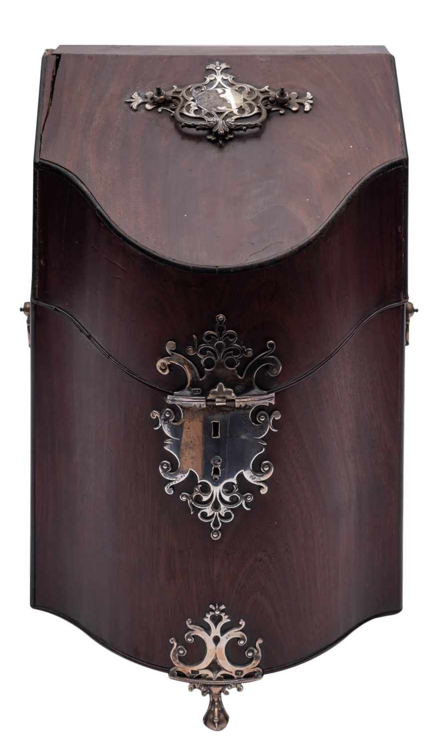 A George III mahogany serpentine fronted knife box with silver handles, lock and feet,