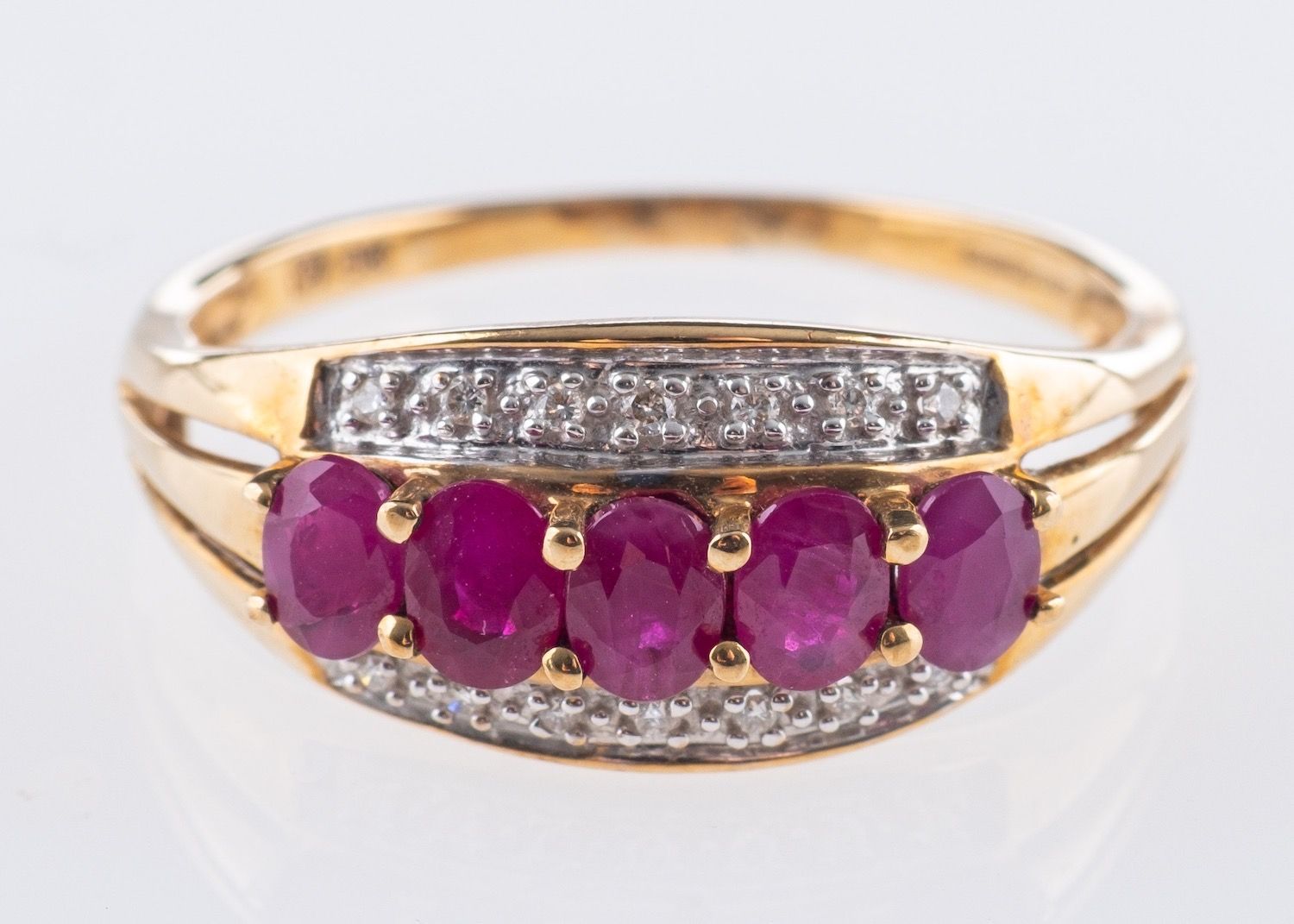 A 9ct yellow gold ruby & diamond ring,