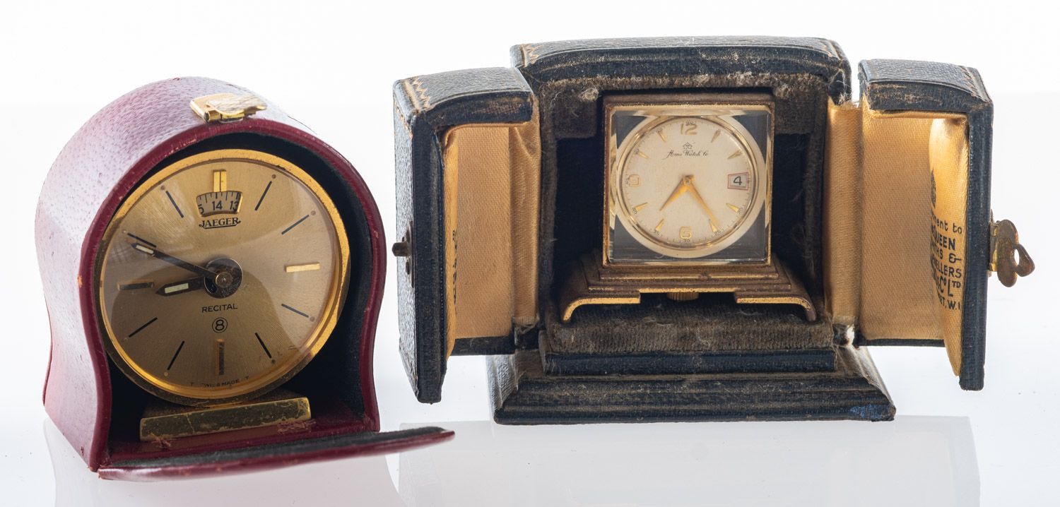 Jaeger, a small gilt travelling alarm clock the dial with baton numerals, - Image 2 of 2