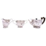 A Victorian three piece silver tea service by Goldsmiths and Silversmiths Co.