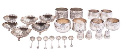 A group of silver items comprising; a cased set of four napkin rings by Henry Atkin, Sheffield 1930,