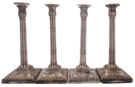 A set of four George III silver candlesticks possibly by John Carter II, London 1770 & 1771,