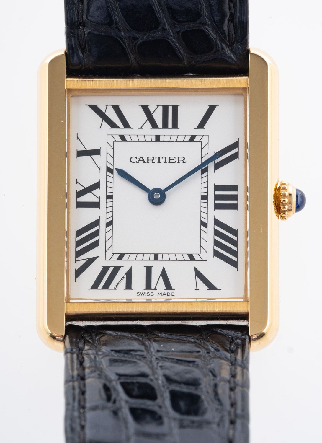Cartier Tank Solo, a stainless-steel and gold wristwatch watch, the dial with black Roman numerals,