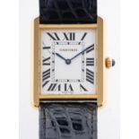 Cartier Tank Solo, a stainless-steel and gold wristwatch watch, the dial with black Roman numerals,
