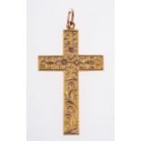 An Edwardian cross pendant, with flower and foliate engraving, UK hallmark, measuring approx. 3.