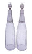 A pair of early 20th century French silver and glass decanters and stoppers,