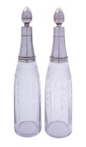 A pair of early 20th century French silver and glass decanters and stoppers,