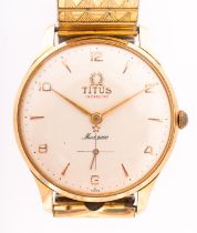 Titus a gentleman's gold-plated wristwatch the cream dial with raised baton and Arabic numerals,