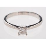 A platinum and diamond ring, set with a single princess-cut diamond, diamond approx. 0.