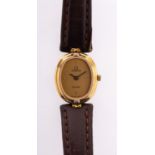 Omega De Ville a lady's wristwatch the oval dial with raised baton quarter-hour numerals and baton