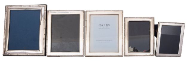 A matched pair of Elizabeth II silver photograph frames by Carr's of Sheffield Ltd,