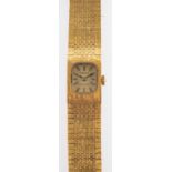 Tissot Stylist, a lady's gold-plated wristwatch with integral bark-finish bracelet,