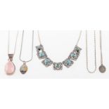 A mixed group of jewellery, including silver and costume jewellery, stone set pendants,