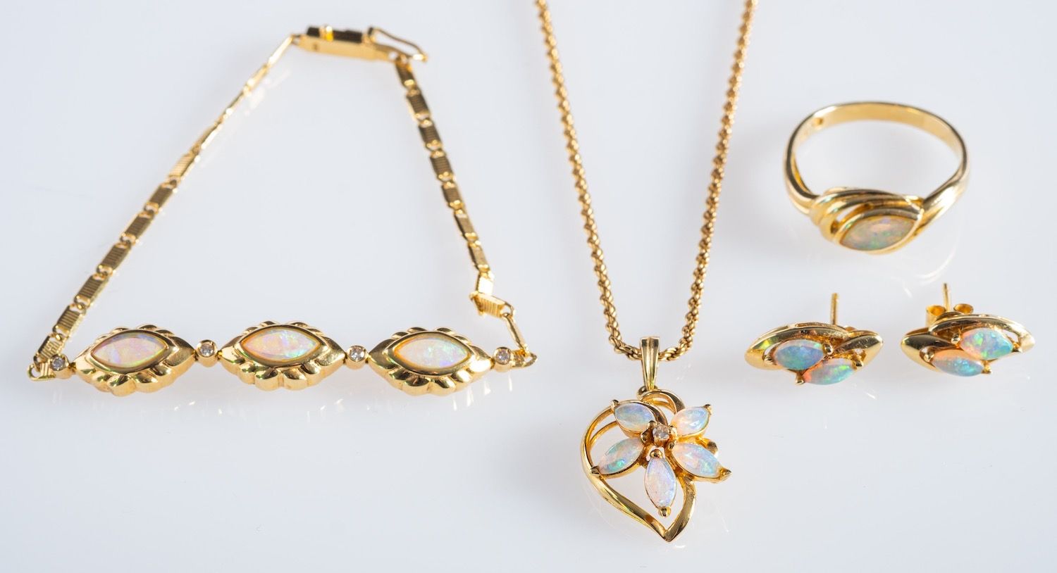A group of opal jewellery,