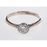 A solitaire ring, set with a brilliant-cut diamond in an eight claw illusion style setting,