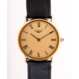 Longines a gentleman's 9ct gold wristwatch the cream dial with Longines logo and black Roman