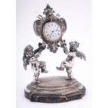 An Italian silver figural watch stand, apparently no maker's mark,