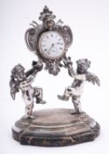 An Italian silver figural watch stand, apparently no maker's mark,