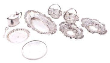 A mixed group of silver comprising: a pair of oval swing handle bon bon dishes, Birmingham 1906,