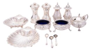 A group of silver items comprising: a matched five-piece cruet set,
