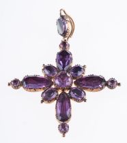 An early 19th century pendant in the shape of a cross,