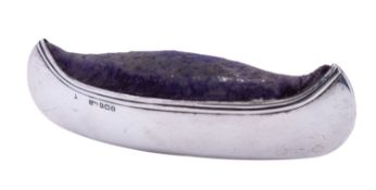 A large Edward VII silver canoe shaped pin cushion by Cohen & Charles, Birmingham 1906,