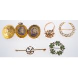 A mixed group of jewellery, including a gold plated oval engraved locket which opens on both sides,