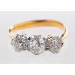 A three stone ring, claw set with old brilliant-cut diamonds, diamonds approx. 1.