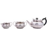 A matched three piece silver tea service, tea pot maker's mark over struck, London 1895,