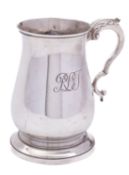 An Elizabeth II silver christening mug by Asprey & Co Ltd, London 1960, of baluster form,