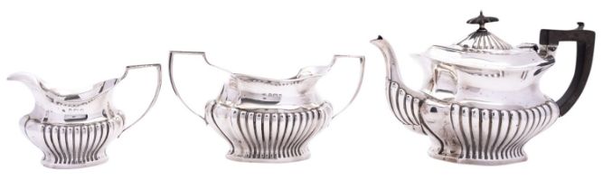 An Edward VII three piece silver tea service by William Adams Ltd, Birmingham 1903,