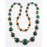 An antique malachite necklace, a string of graduated malachite beads, (the malachite beads