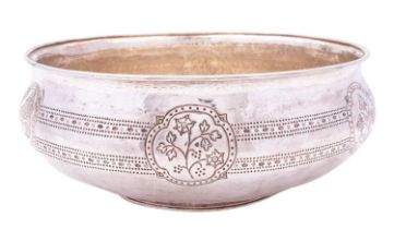 An Arts and Crafts circular bowl by Philip Frederick Alexander, London 1910, hammered body,