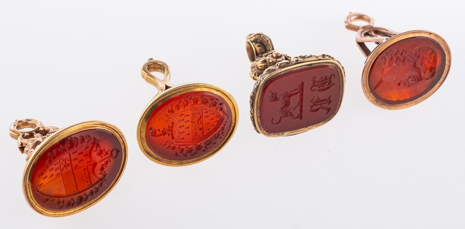 A group of hardstone fob seals, including five carnelian set fob seals, unmarked, tests as 9ct, - Image 2 of 3
