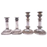 A pair of 19th century Sheffield plated telescopic candlesticks with cast bands of foliage,