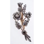 A Victorian flower and foliate spray brooch, set with old-cut diamonds, pin and safety catch,