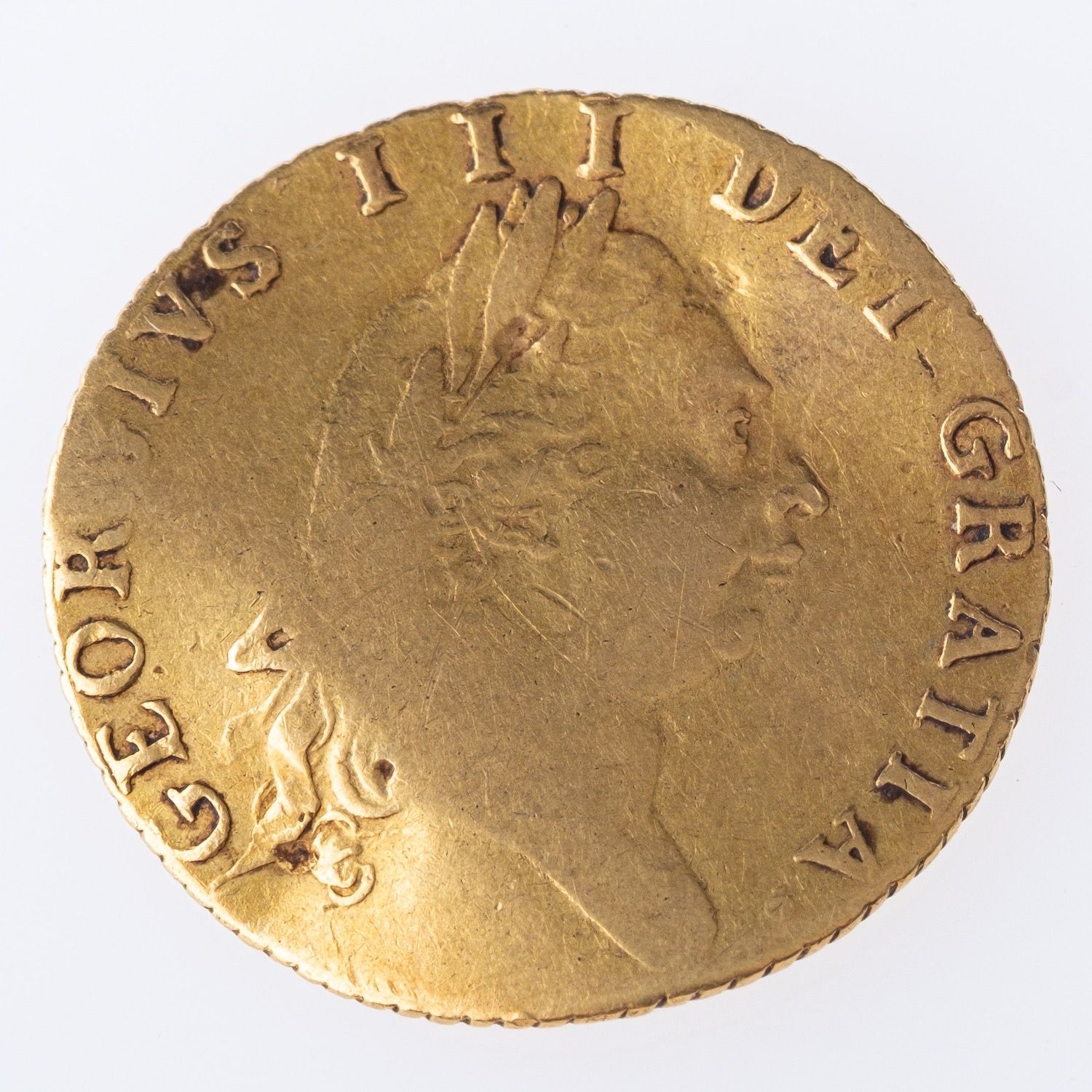 A George III gold coin, unmounted, worn, dated 1788, 4.0grams. - Image 2 of 2