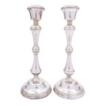 A pair of Elizabeth II silver candlesticks by W. I .