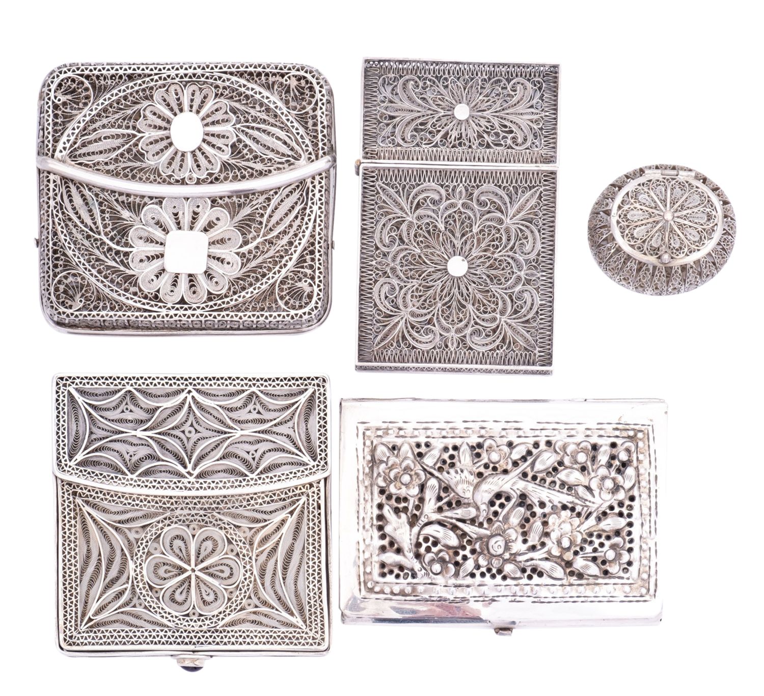 A 19th century filigree silver card case, unmarked, of rectangular form, hinge, 8.