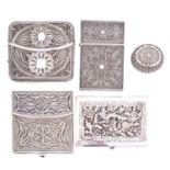 A 19th century filigree silver card case, unmarked, of rectangular form, hinge, 8.