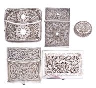 A 19th century filigree silver card case, unmarked, of rectangular form, hinge, 8.