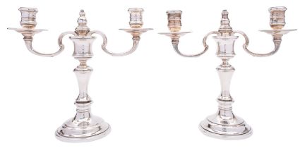 A pair of Edward VII silver candlesticks by Elkington & Co Ltd, Birmingham 1902, no scones,