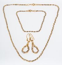 A matching suite of jewellery, to include a two-colour herringbone style flat snake chain necklace,