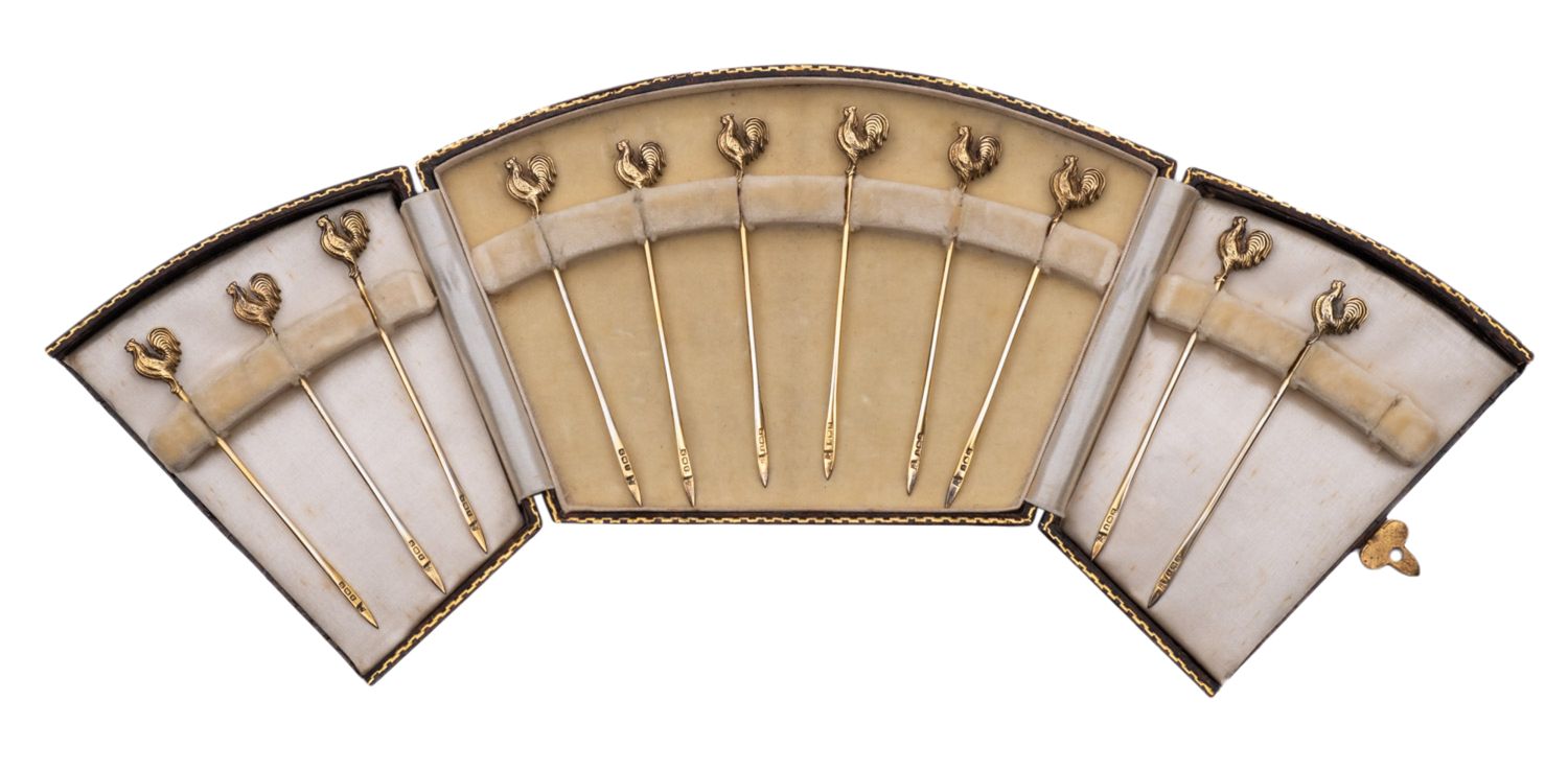 A part cased set of silver gilt cocktail stick/ toothpicks by Asprey & Co Ltd, Birmingham 1937,