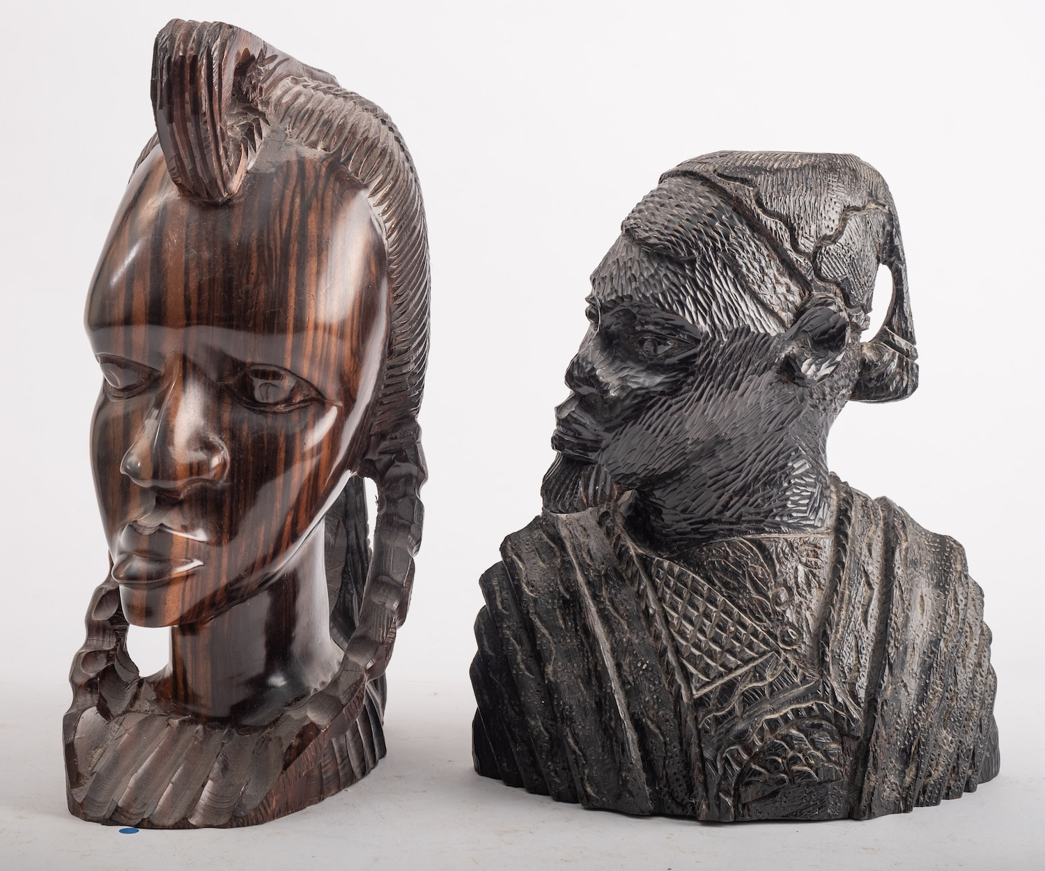 Two African carved hardwood busts, 20th