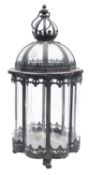 A metal and glazed ceiling lantern, of r