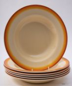 A set of six Clarice Cliff soup bowls, o