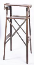 A steel cross frame projection stand, wi