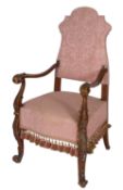 A mahogany and upholstered elbow chair i