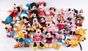 A collection of Disney soft toys mostly